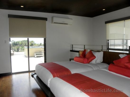 Bedroom of a One Bedroom Premiere Suite at Discovery Shores Resort in Boracay, Philippines.